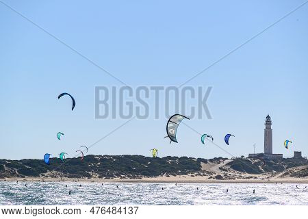 Los Caños De Meca, Barbate, Cádiz; August 19, 2022: Athletes Practicing Kitesurfing In Front Of The 