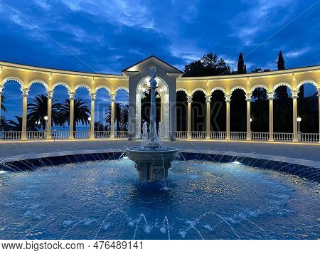 Gagra, Abkhazia, Georgia - 10 April, 2023: Evening View On Historical Colonnade And Fontain At Old G