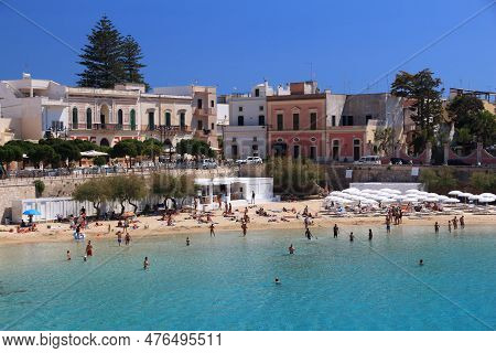 Apulia, Italy - May 30, 2017: Beachgoers Visit Santa Maria Al Bagno Beach In Puglia Region, Italy. W