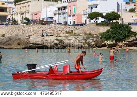 Apulia, Italy - May 30, 2017: Beachgoers Visit Santa Maria Al Bagno Beach In Puglia Region, Italy. W