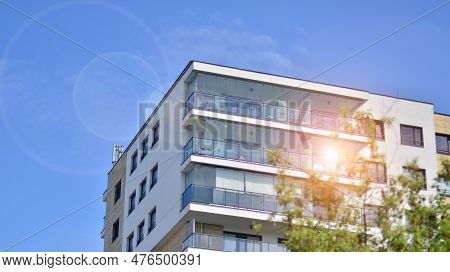 Eco Architecture. Green Tree And New Apartment Building. The Harmony Of Nature And Modernity. Modern