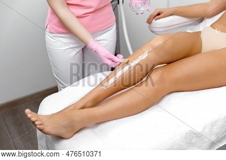 Applying Gel, Pre-laser Gel, Hair Removal. Cosmetologist Cleanses The Facial Skin. Rejuvenation Trea