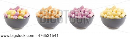 Set Of Bowls With Colorful Corn Puffs On White Background