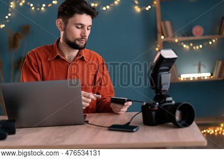 Photographer Working At Home Office. Workflow Of Freelance Photographer. Export Or Transfer Data Fil