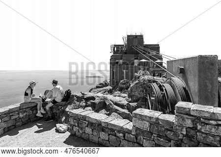 Cape Town, South Africa - Sep 14, 2022: Tourists At A Viewpoint On Table Mountain. Cable Anchors Of 