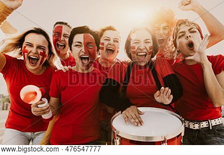 Women's Football Fans Having Fun Cheering Their Favorite Team - Soccer Sport Entertainment Concept