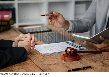 Client Was Listening To A Lawyer Advising On An Embezzlement Case, Explaining The Details Of The Pro