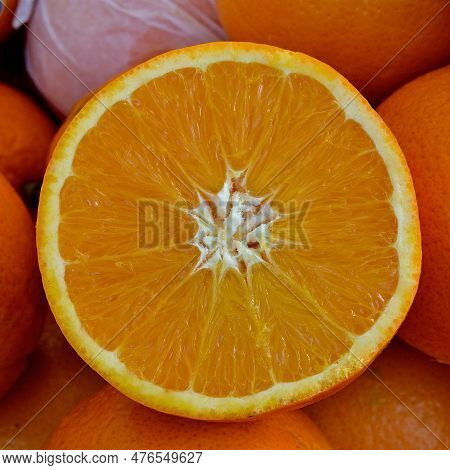Orange Cut By The Half On A Market Of Berga, Catalonia, Spain.
