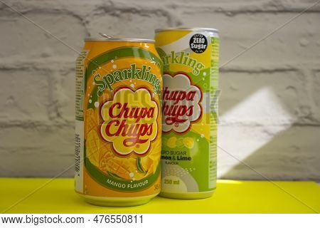 May 18, 2022 Ukraine City Kyiv Drink Chupa Chups On A Colored Background