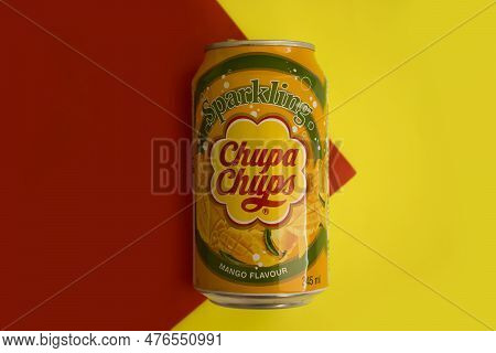 May 18, 2022 Ukraine City Kyiv Drink Chupa Chups On A Colored Background