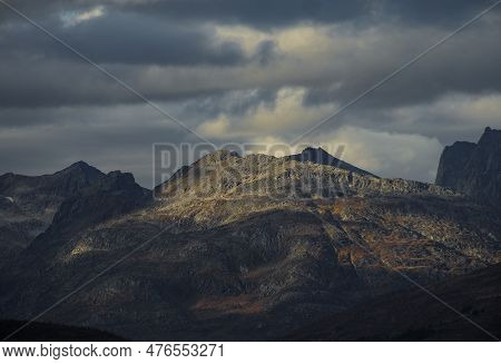 Dramatic Light And Clouds Over Mountain Peaks Of Northern Norway, Landscape And Nature Of Arctic Sca