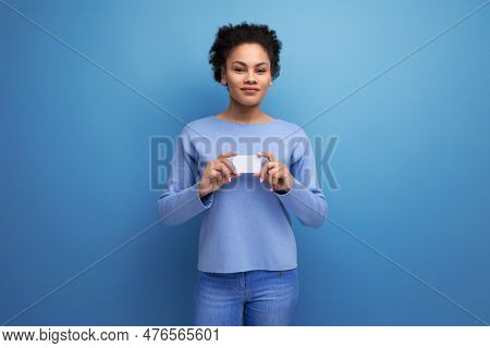 Positive Young Latin 20c Woman Holding Card Mockup