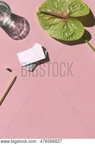 Business Card White Mosk Up On The Colorful Pink Background With Tropical Flower Flat Lay. Top View.
