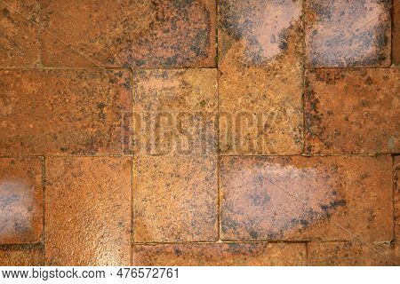 The Surface Is Made Of Brick Blocks In Orange Color. 
Brickwork For The Floor After The Rain. Copy S