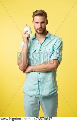 Photo Of Young Man With Perfumery. Man With Perfumery. Man With Perfumery
