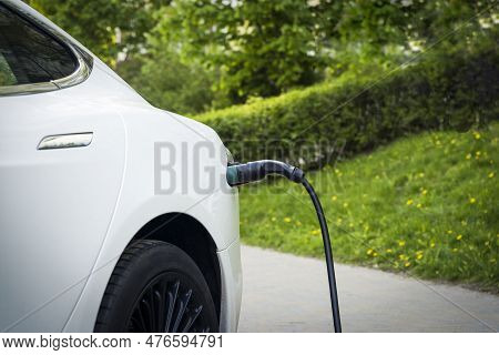 Charging Station For Electric Cars. Types And Connectors Of Ports For Charging Vehicles.