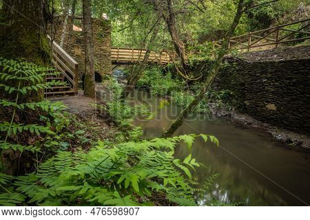 Surrounding Landscape Of The Estanislau Fountain Park And The Lourido River That Divides The Parishe