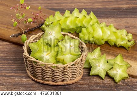 Star Fruit Or Carambola Green - Averrhoa Carambola; Photo On Wooden Background