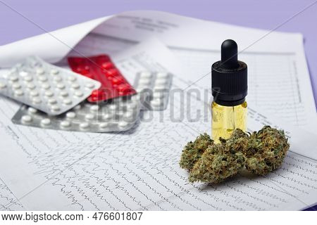 Against The Background Of The Results Of Electroencephalography Lie A Glass Bottle With Yellow Cbd O