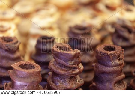 A French Spit Cake Consisting Of Layers Of Batter Placed, One At A Time, On A Rotating Spit Cooked R