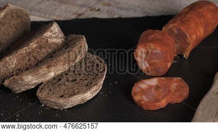 Bread And Sausage. Traditional Ingredients For Caldo Verde Are Potatoes, Collard Greens, Olive Oil A