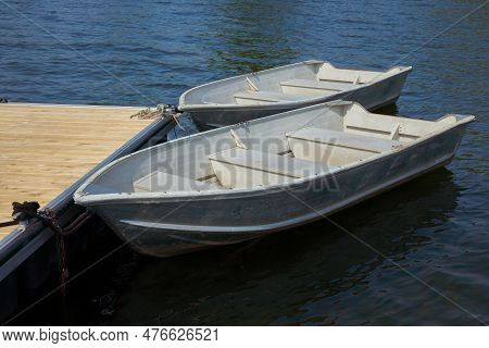 Two Boats On A Lake Rowboats Docked On A Calm Water Nautical Peaceful Tranquil Scene In Magog Quebec