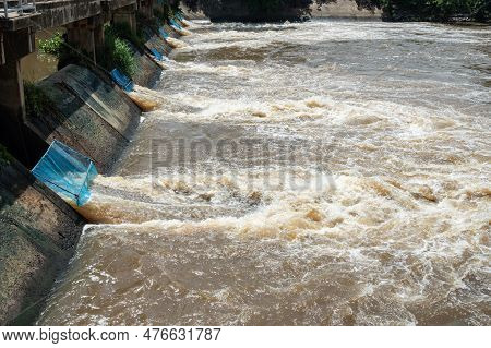 Dam Release Water For Prevent Flooding After Heavy Rainfall. There Is A Flood Control And Warning Sy