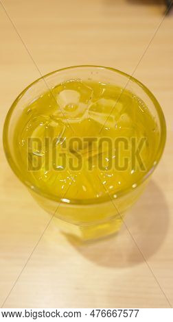 Japanese Green Tea Or Ocha Tea Or Yellow Drink Tea Served In A Tall Glass. Ryokucha Japanese Tea.