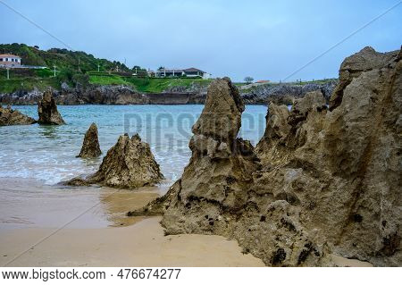 View On Playa De Toro In Llanes, Green Coast Of Asturias, North Spain With Sandy Beaches, Cliffs, Hi