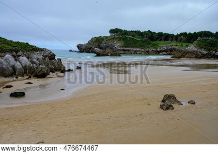 View On Playa De Palombina Las Camaras In Celorio, Green Coast Of Asturias, North Spain With Sandy B