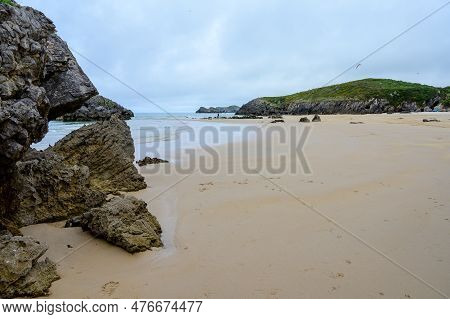 View On Playa De Borizo In Celorio, Green Coast Of Asturias, North Spain With Sandy Beaches, Cliffs,
