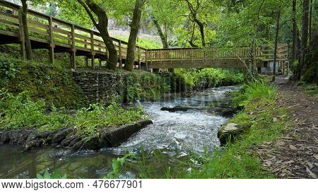 Surrounding Landscape Of The Estanislau Fountain Park And The Lourido River That Divides The Parishe