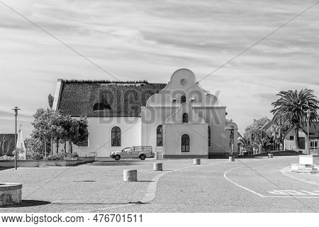 Elim, South Africa - Sep 21, 2022: A Street Scene, With The Historic Moravian Church, In Elim, In Th