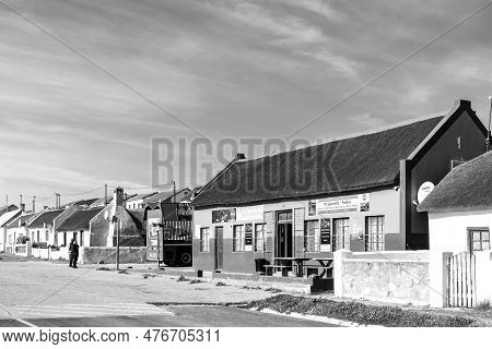 Elim, South Africa - Sep 21, 2022: A Street Scene, With A Supermarket And Delivery Truck, In Elim, A