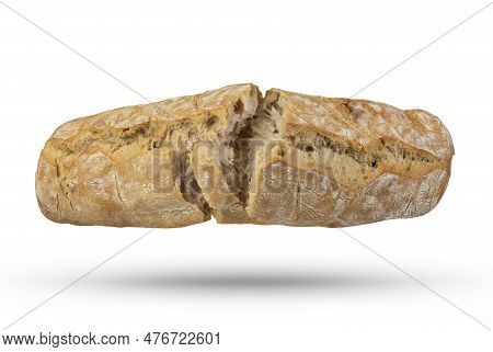A Loaf Of Italian Fresh Ciabatta Bread Is Broken Into 2 Parts On A White Isolated Background. Bread 