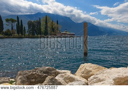 Lake Garda, Italy - 25 April 2022 Panoramic View Of The Bay And Vintage Paddle Steamer Ship Italia. 