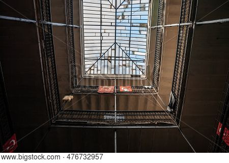 Istanbul, Turkey - May 22, 2022: Turkish Flags Hanging On The Interior Of A Vintage Building In The 