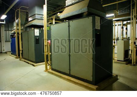 The Factory Walkway And Machine For Processing Metal Part Of Car. Warehouse And Store Keep Material 