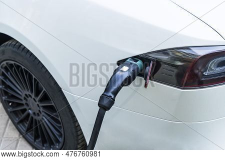 Charging Station For Electric Cars. Types And Connectors Of Ports For Charging Vehicles.