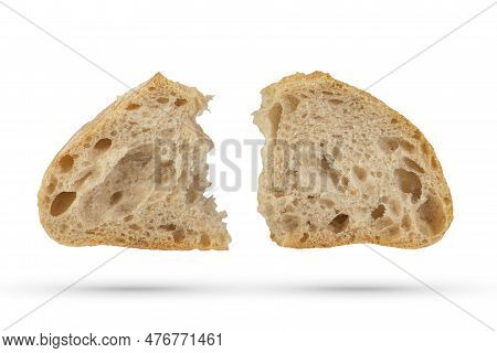 Two Slices Of Fresh Ciabatta Bread On A White Isolated Background. Slices Hang Or Fall On A White Ba