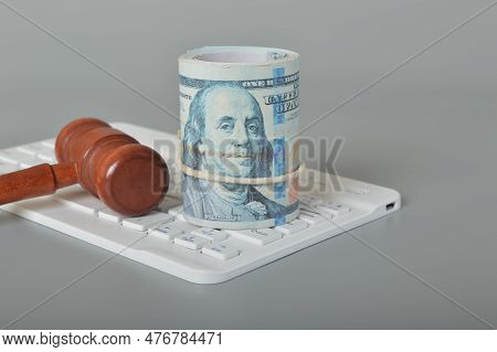 Money, Judge Gavel And Computer Keyboard.the Internet Crime Concept Casts A Shadow Over The Realm Of