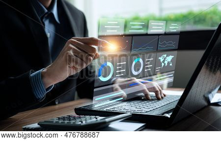 Businessman Analyzing Business Enterprise Data Management, Business Analytics With Charts, Metrics A