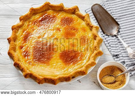 Classic Sugar Cream Pie, Hoosier Pie, Indiana Custard Cream Pie On White Baking Dish On White Wood T