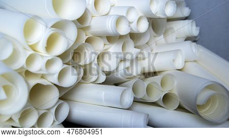 A Pile Of Papyrus Manuscripts On The Table