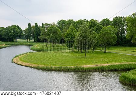 Green Park Around The Canal Of The Historical Village Center, Hulst, Zeeland, The Netherlands