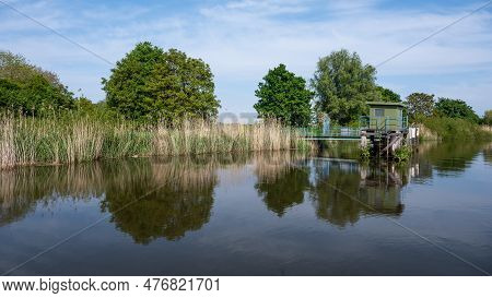Scenic View Over Nature Reflections In The Water Of The River Durme, Tielrode, Flanders, Belgium