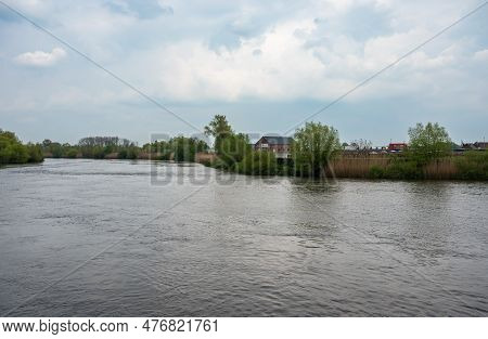 The River Dender Streaming In The River Scheldt, Dendermonde, East Flanders, Belgium