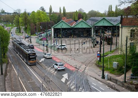 Auderghem, Brussels Capital Region, Belgium - April 29, 2023 - Cars And A Tramway Passing At The Tra