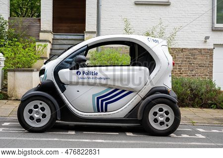 Uccle, Brussels Capital Region, Belgium - May 10, 2023 - Small Electric Police Vehicle Renault Twizy