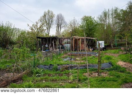 Uccle, Brussels Capital Region, Belgium - May 10, 2023 - Small Sheds And Cabins Of Allotment Gardens